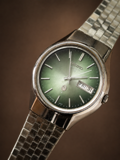 Vintage Seiko dark green sunburst quartz watch detail view 2 thumbnail 2