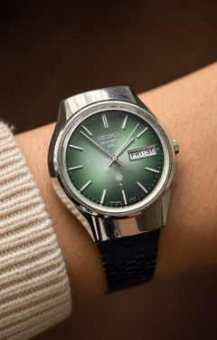 Vintage Seiko dark green sunburst quartz watch product photo thumbnail 1