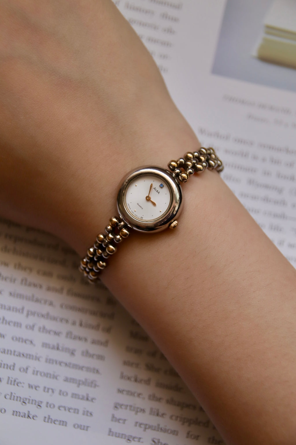 Alba Two-Toned Beaded Bracelet Watch With Blue Jewel